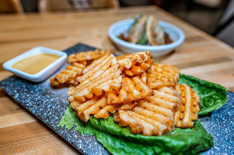 Seasoned starbird waffle fries golden crispy