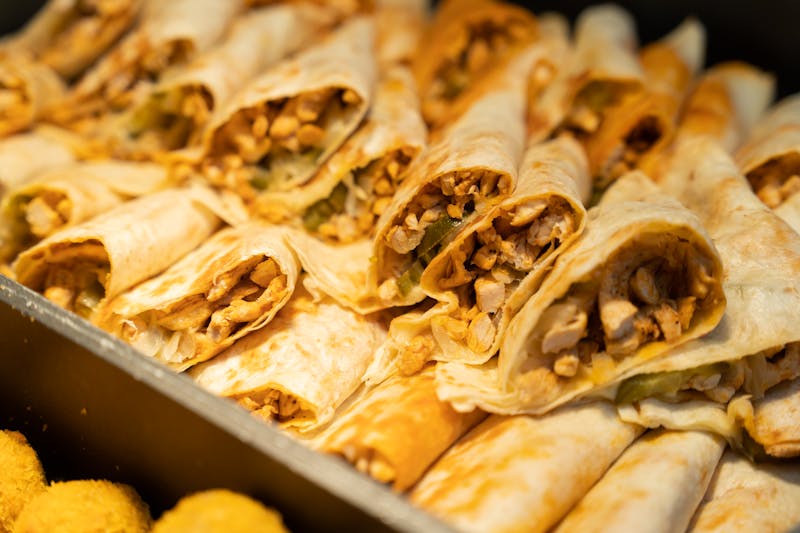 BBQ starbird chicken rice bowl with corn and beans